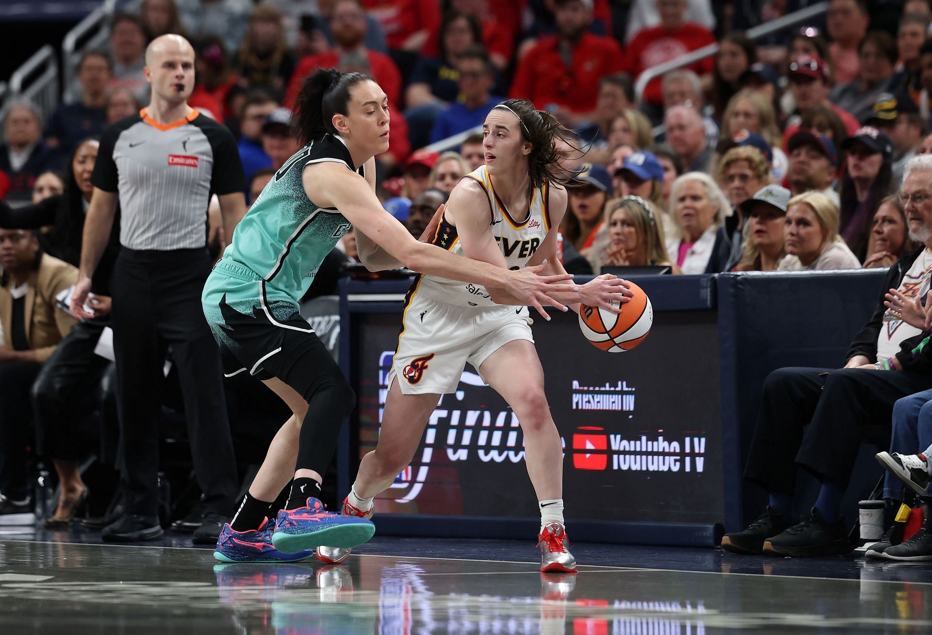 Caitlin Clark #22 of the Indiana Fever in action during a WNBA game. (Credits: Getty)